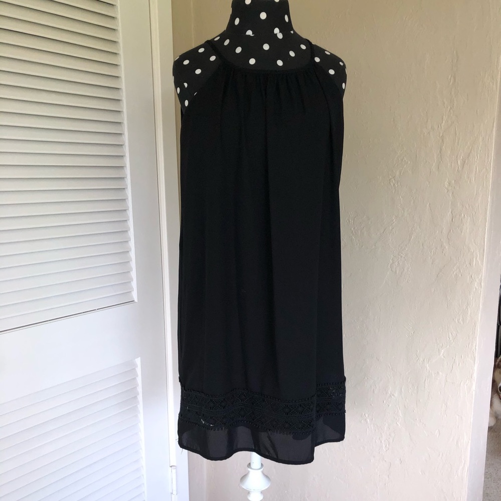 Black flowy dress with lace hem detail